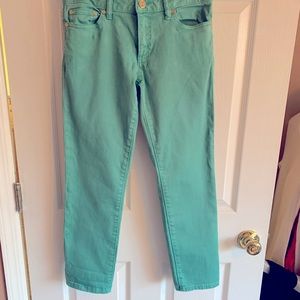 Green chopped skinny jeans size 26